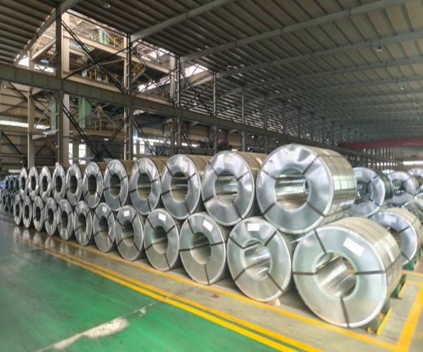 Steel coil production workshop with organized inventory